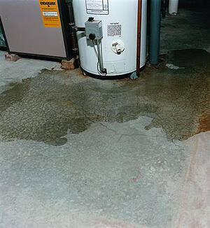 puddles around water heater